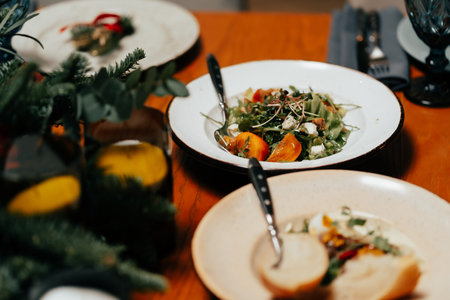 Caesar salad in a beautiful plate on a served table restaurant is decorated with microgreensの写真素材