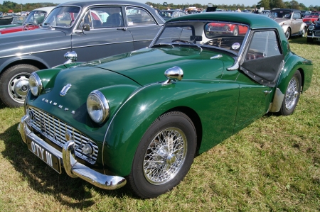 WEST SUSSEX, ENGLAND. SEPTEMBER 2012: Vintage Triumph TR3 at the Goodwood Revival festival on 15th September 2012; Goodwood , West Sussex, England.のeditorial素材