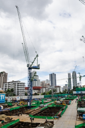 BANGKOK - OCTOBER 8 : Construction site with multiple cranes at Sukhumvit road on October 8, 2012 in Bangkok, Thailand.のeditorial素材