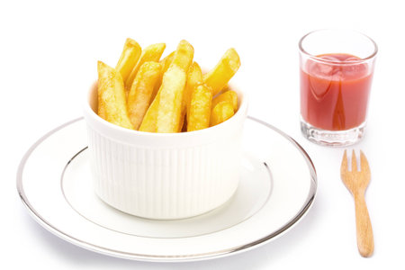 French fires with ketchup on white background