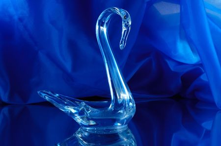 glass swan on blueの写真素材