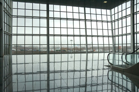 view through big windows of  glass hall  on urban scene