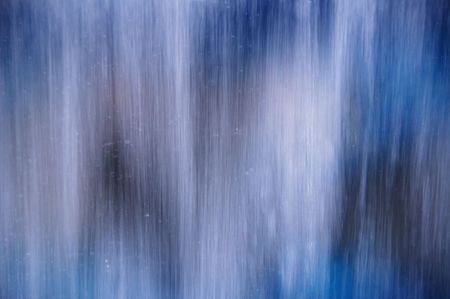 blue abstract background -water runs on blue gass - sort focusの写真素材