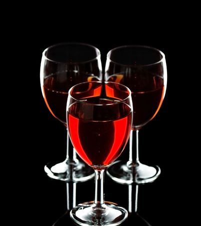 wine in glass on dark backgroundの写真素材