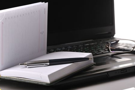 laptop, organizer, glasses on whiteの写真素材