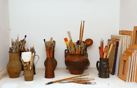paintbrushes and another tools  in art studio の写真素材