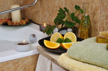 spa in home bathroom with handmade herbal soapの写真素材