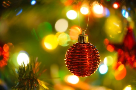 background  of inside decorated Christmas fir tree with colorful lights  の写真素材