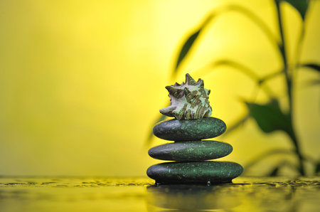  spa still life with bamboo on glowing yellow background