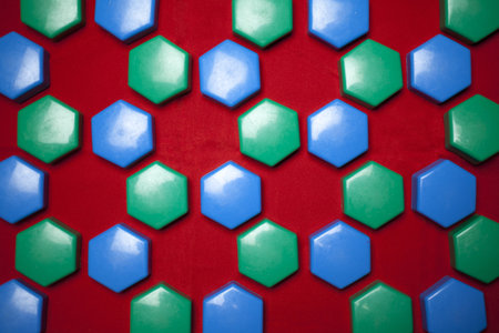 Colorful rainbow dots are scattered and clumped together.