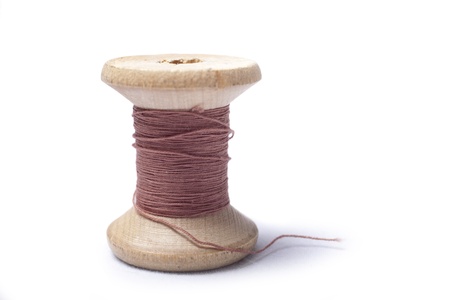 A spool shoe thread isolated on a white backgroundの写真素材
