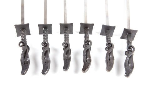 the metal skewers isolated on white background