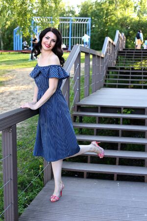 Outdoors portrait of beautiful woman on summer daysの写真素材