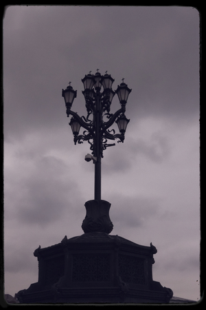 This photo street lamp made night in bad weather.の写真素材