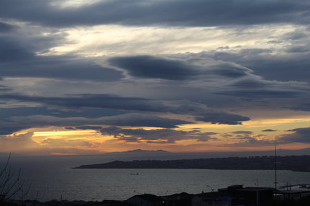 Sunset over the sea in the city of Palermo, Sicilyの写真素材