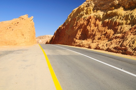 Highway through stone desert. Negev. Israel. の写真素材