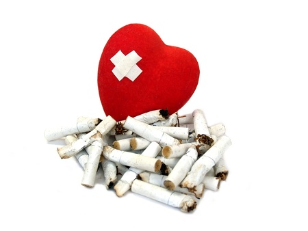 Sore heart and stubs. Harm of smokingの写真素材
