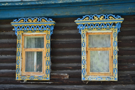 Two windows with carved platbandsの写真素材