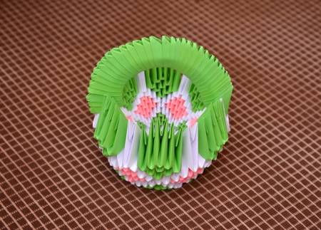 Basket in equipment of origami against a dark backgroundの写真素材