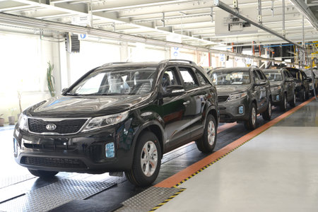 Ready cars stand on the conveyor line of assembly shop. Automobile plantのeditorial素材