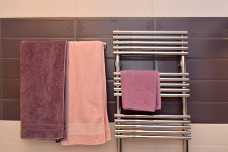 Terry towels hang in a bathroomのeditorial素材