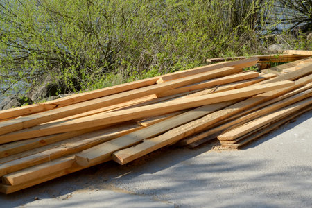 Wooden bars lie on the earth