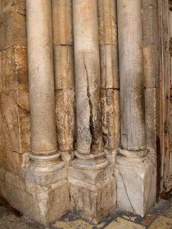 Column of Sacred Fire (rassechyonny column) of a portal of a main entrance in Church of the Resurrection (the temple of the Lord's Coffin) in Jerusalem, Israelの写真素材