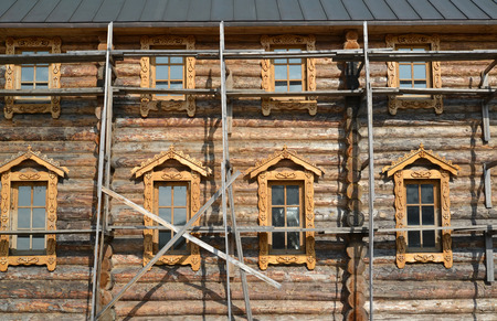 The construction woods on a wall of the wooden building. Sacred and Troitsk Trifonov-Pechengsky man's monastery, Murmansk regionの写真素材