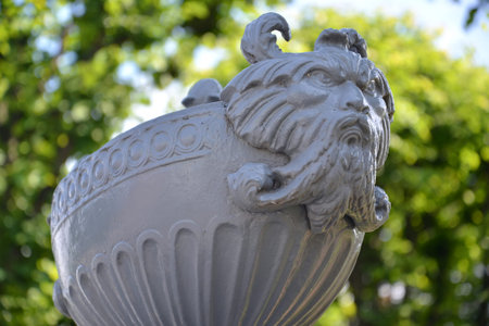 Maskaron-satir on a decorative bowl. St. Petersburgの写真素材