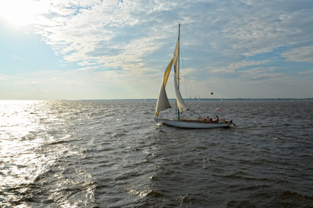 ST. PETERSBURG, RUSSIA - JULY 09, 2014: The sailing walking yacht rushes across Srednyaya Nevka...