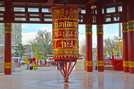 ELISTA, RUSSIA - APRIL 18, 2017: A prayer wheel with a mantra of Ohms of Manya Padme Hum in a pagoda of Seven Daysのeditorial素材