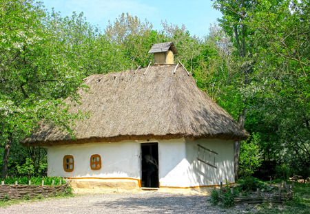 Old mud hut in Ukraineの写真素材