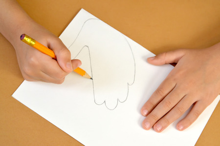 Production of a gift card Valentine's Day card with pigeons. Step-by-step process: drawing of a wing of a pigeonの写真素材