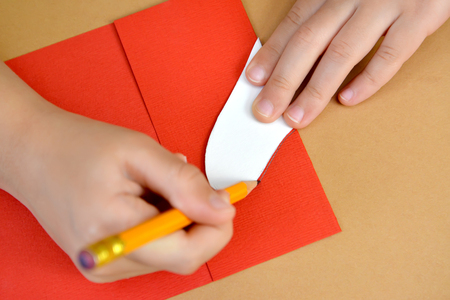 Production of a gift card Valentine's Day card with pigeons. Step-by-step process: inking of preparation of heartの写真素材
