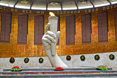 VOLGOGRAD, RUSSIA - APRIL 23, 2017: An eternal flame in the Hall of Military glory. Mamayev Kurganのeditorial素材
