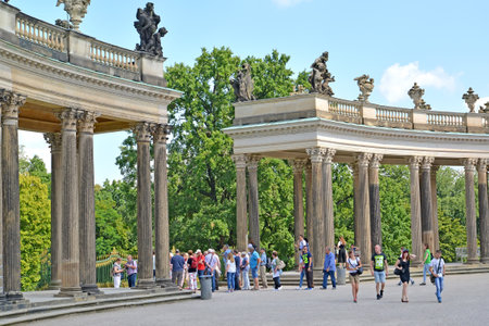 POTSDAM, GERMANY - AUGUST 14, 2017: Tourists about a colonnade of the palace of Frederick the Great in the Sanssousi  parkのeditorial素材