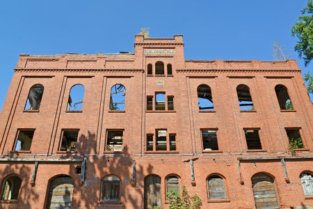 Facade of the building of a mill of Gerdauen of 1909 of construction. Zheleznodorozhnyj, Kaliningrad region. German text "Castle mill"のeditorial素材