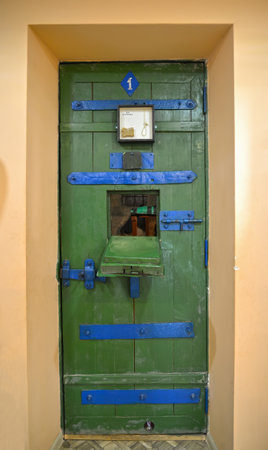 UGLICH, RUSSIA - MAY 21, 2018: A door to the prison cell. Museum of prison artのeditorial素材