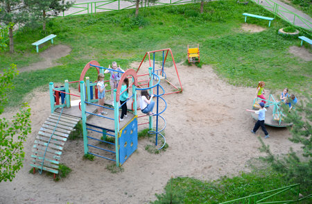 RYBINSK, RUSSIA - MAY 15, 2018: Children play in the playground, the top viewのeditorial素材