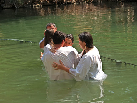 YORDANIT, ISRAEL - OCTOBER 06, 2012: Pilgrims make ablution in holy waters of the Jordan Riverのeditorial素材