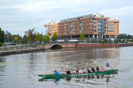 GDANSK, POLAND - AUGUST 24, 2018: A view of the Motlava River with the canoe floating on waterのeditorial素材