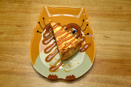Cheesecake lies on decorative plate