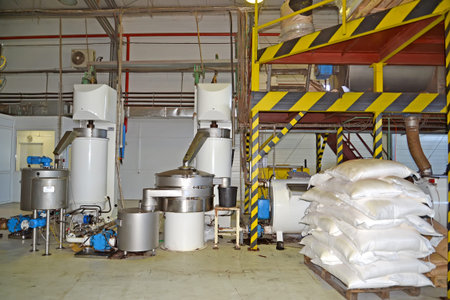 Equipment on the chocolate mass production site in the production shop. Chocolate Factory