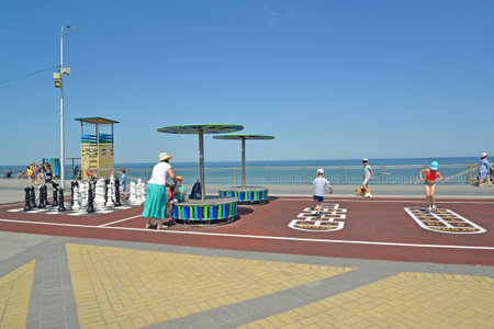 ZELENOGRADSK, RUSSIA - JUNE 25, 2020: Children play classics on the promenade. Kaliningrad regionのeditorial素材