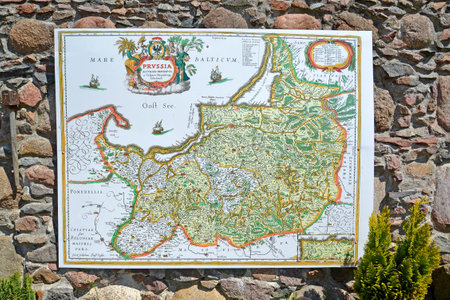 KALININGRAD REGION, RUSSIA - MAY 08, 2018: Old map of East Prussia (modern reconstruction) on the fortress wall. Schaaken castleのeditorial素材