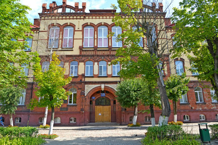 Fragment of the building of secondary school number 6 (formerly a secondary school for boys, 1902). Chernyakhovsk, Kaliningrad regionのeditorial素材