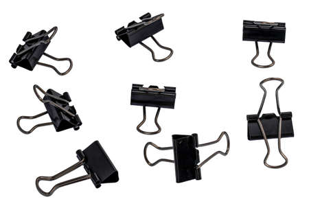 A group of metal paper clips in black, isolated on a white background, for office, work, school and business conceptsの写真素材