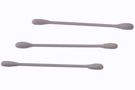Three white cotton buds with plastic material isolated on a white background, for the theme of health, beauty, and cleanlinessの写真素材