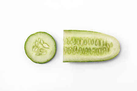 Cucumber for fresh vegetables in sliced form, isolated on white background, copy spaceの写真素材