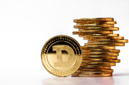 A pile of Dogecoin that has a gold color that is currently popular and has an increasing value compared to the US Dollar. For payment, finance, investment and economy conceptsの写真素材